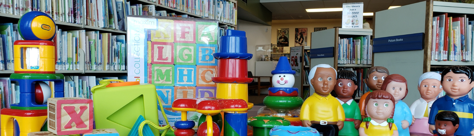 Toys in front of the children's shelves